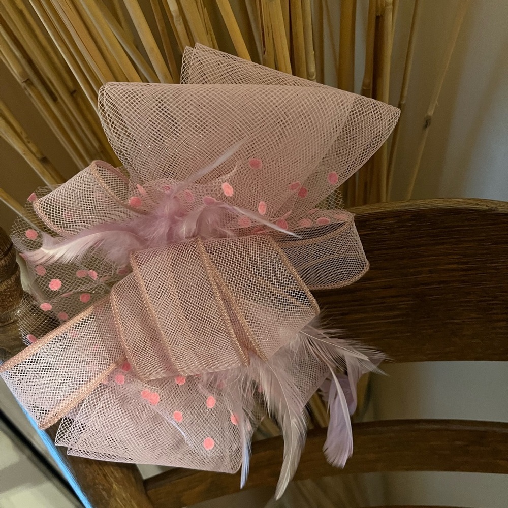 Blush pink Bow shaped fascinator, formal headpiece, hair clip with feathers